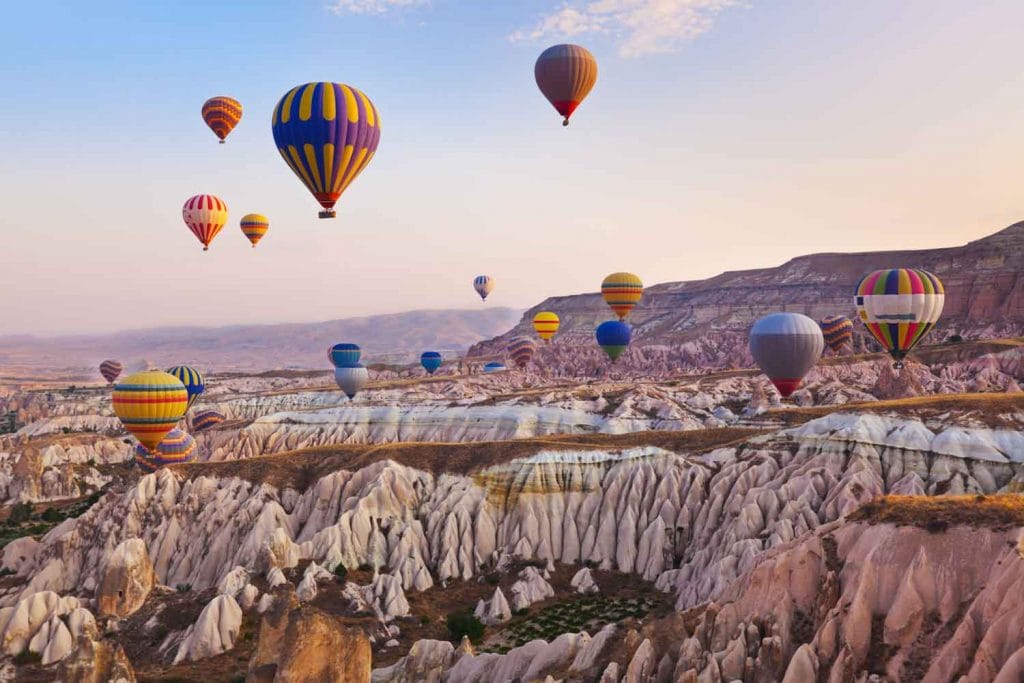 Hot air balloon flying over Cappadocia Turkey 1024x683