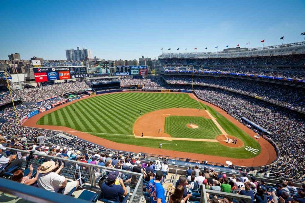 e people watching a baseball game at Yankee Stadium ny usa 1024x683