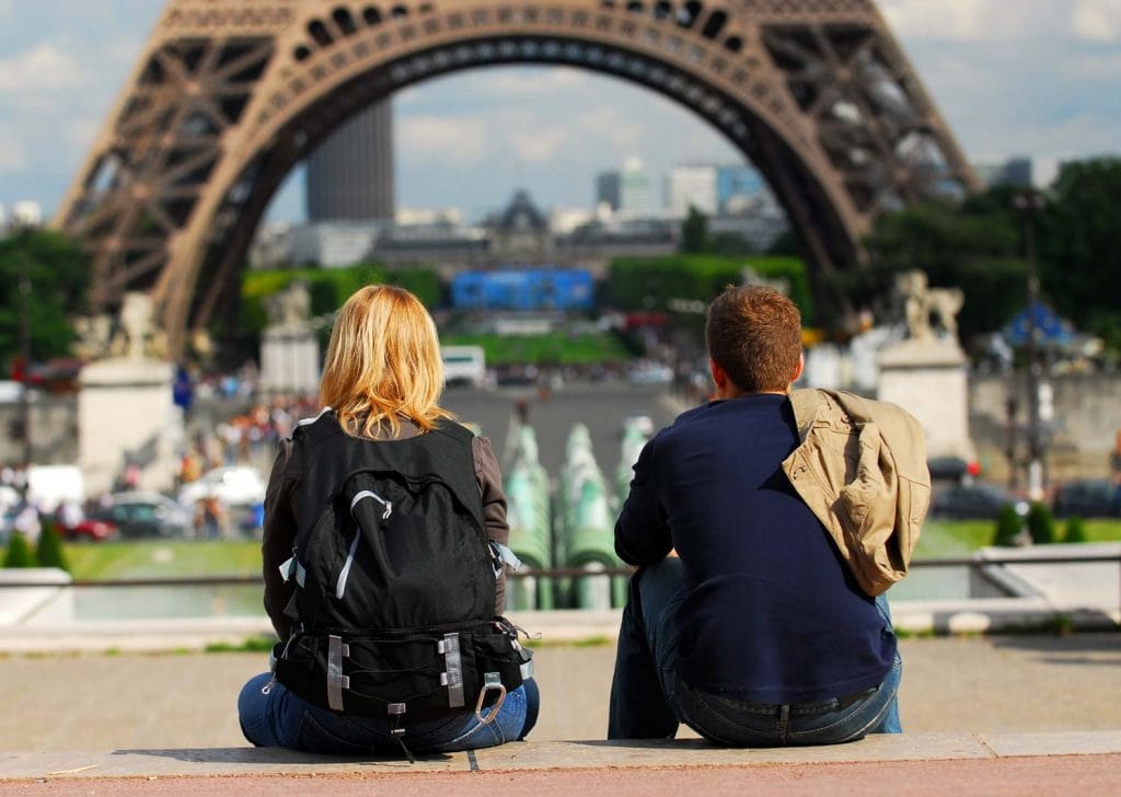 woman carrying abackpack in paris 1024x728