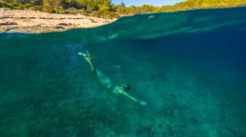 Girl freediving in the Adriatic Sea on Hvar island