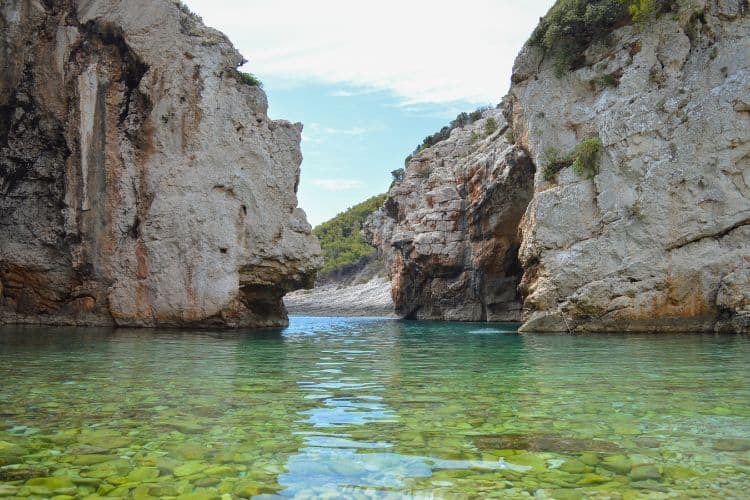Natural beauty Stiniva cove surrounded with cliffs at Vis island Croatia