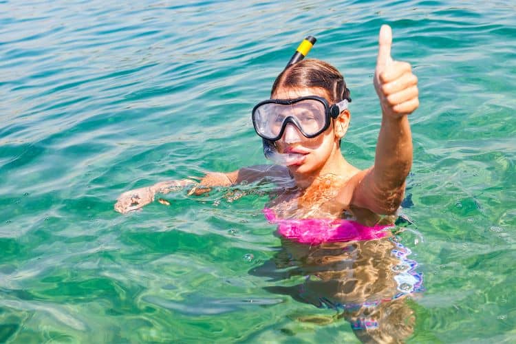 Young woman snorkeling in Trogir Croatia